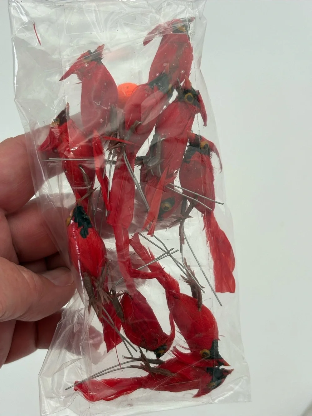 11 Crafting Redbirds with Feathers and Metal Twist Connectors